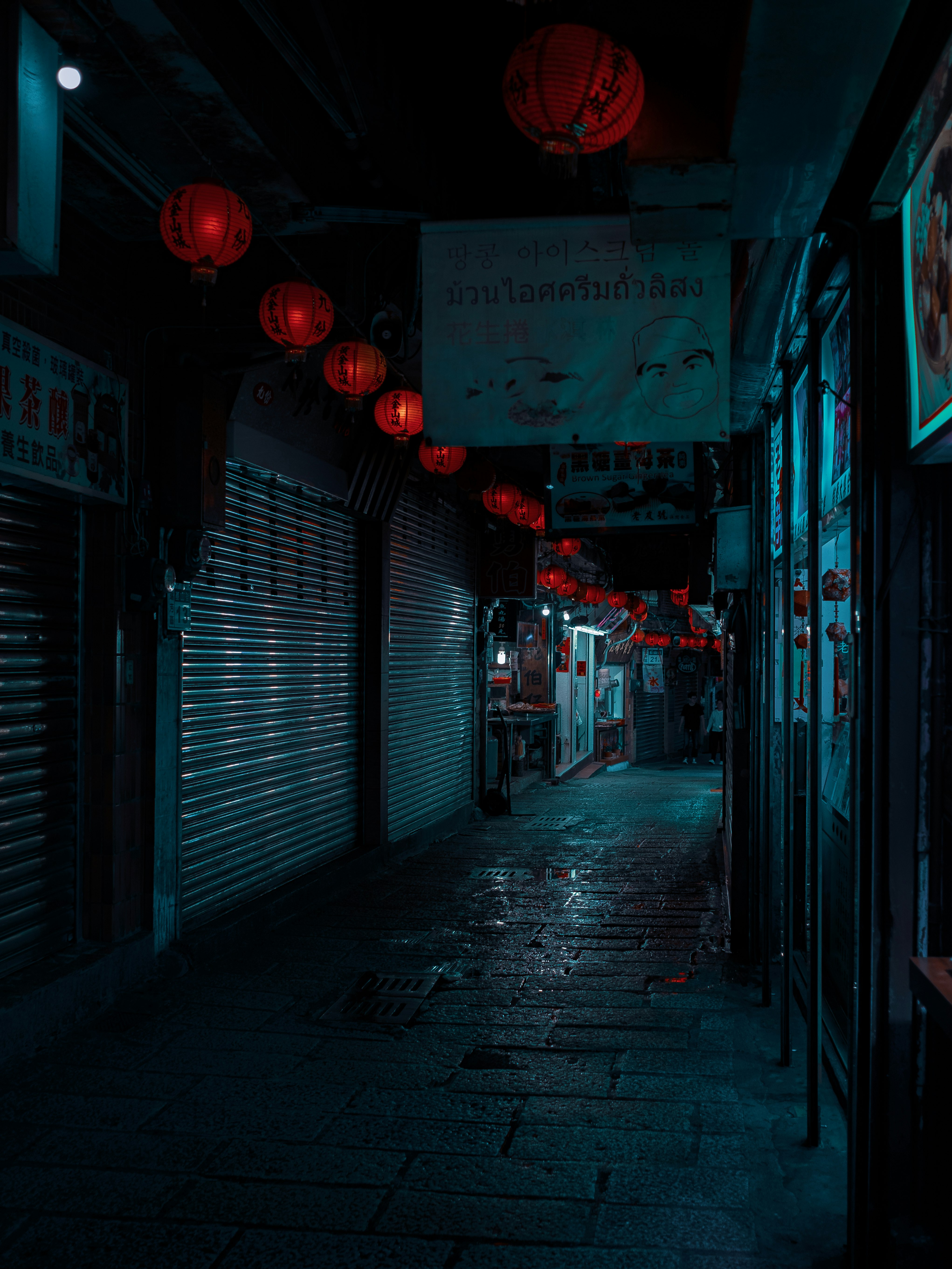 empty street with red light during night time